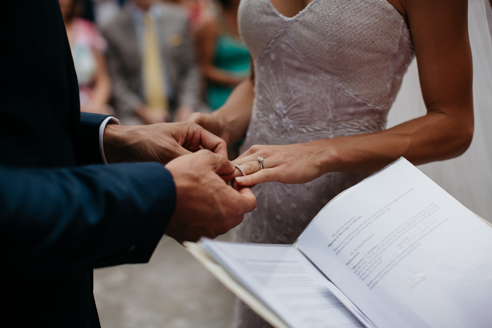 Bride and Groom during their ceremony in Saint Mark Church in Hvar in Croatia ring exchange