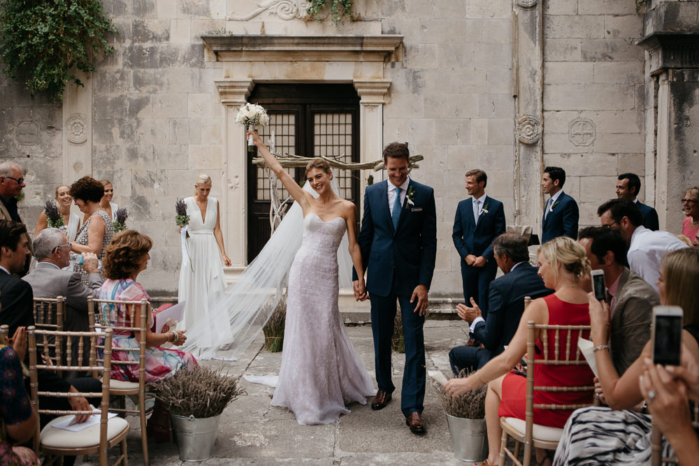 Bride and Groom during their ceremony in Saint Mark Church in Hvar in Croatia