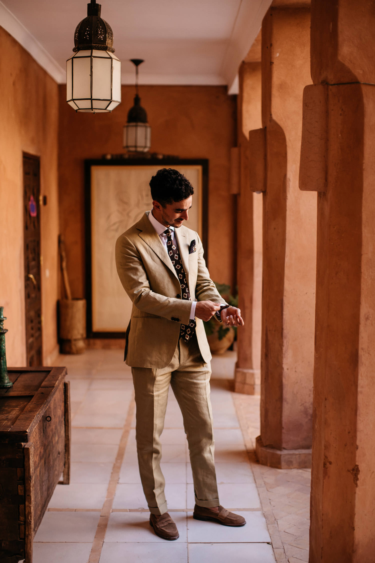 Groom getting ready at Kasbah Bab Ourika